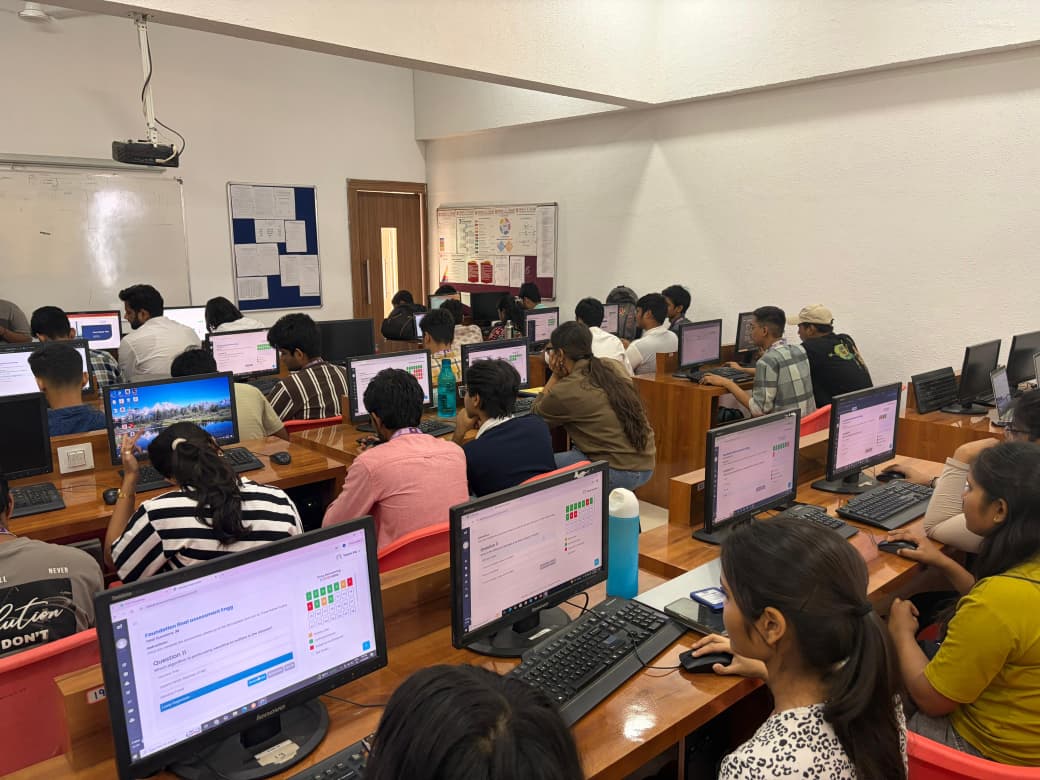 Hands-on coding workshop with participants at laptops