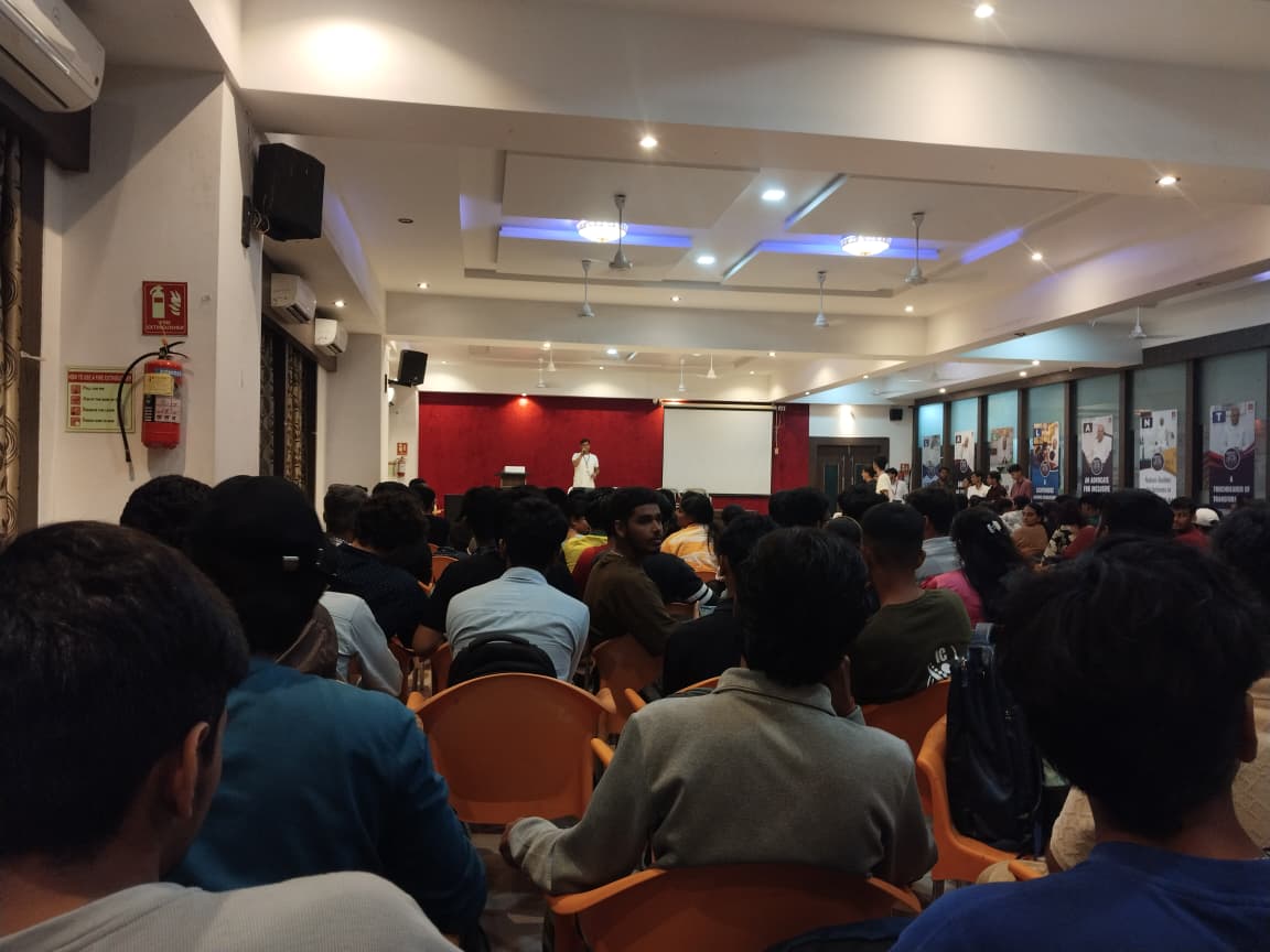 Founder pitching on stage at a startup event
